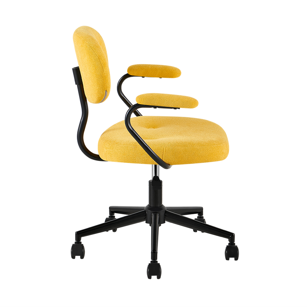 Yellow upholstered office chair with rounded button-detail back, yellow arm pads and black caster base, side view
